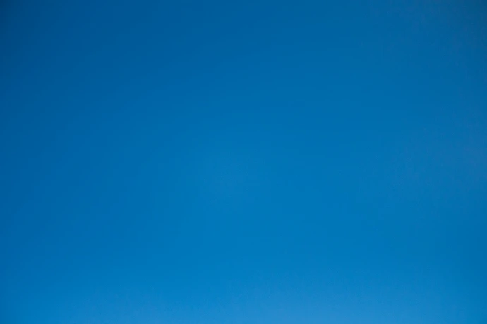A clear and cloudless bright blue sky